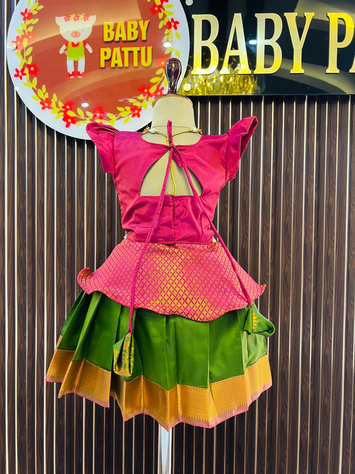 Maroon Peplum Top and Mehendi Green Pattu Pavada