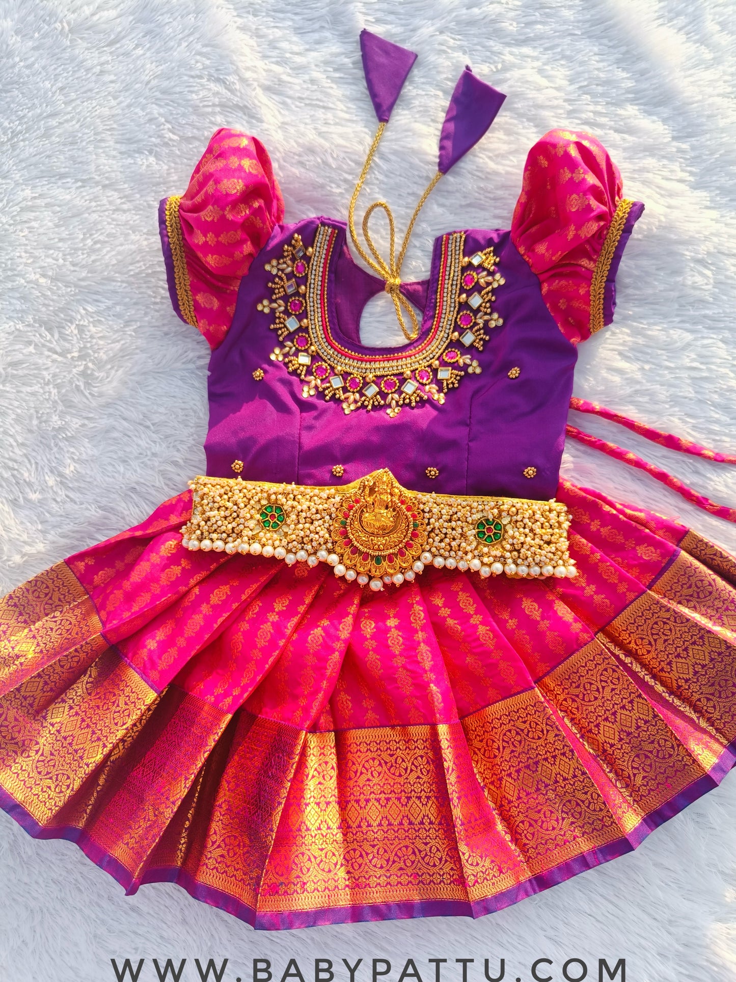 Purple top and Rani pink bottom Pattu Pavada With Hip belt