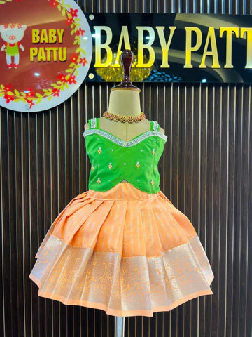 Green Color Crop Top And Lite Orange Bottom Pattu Pavada