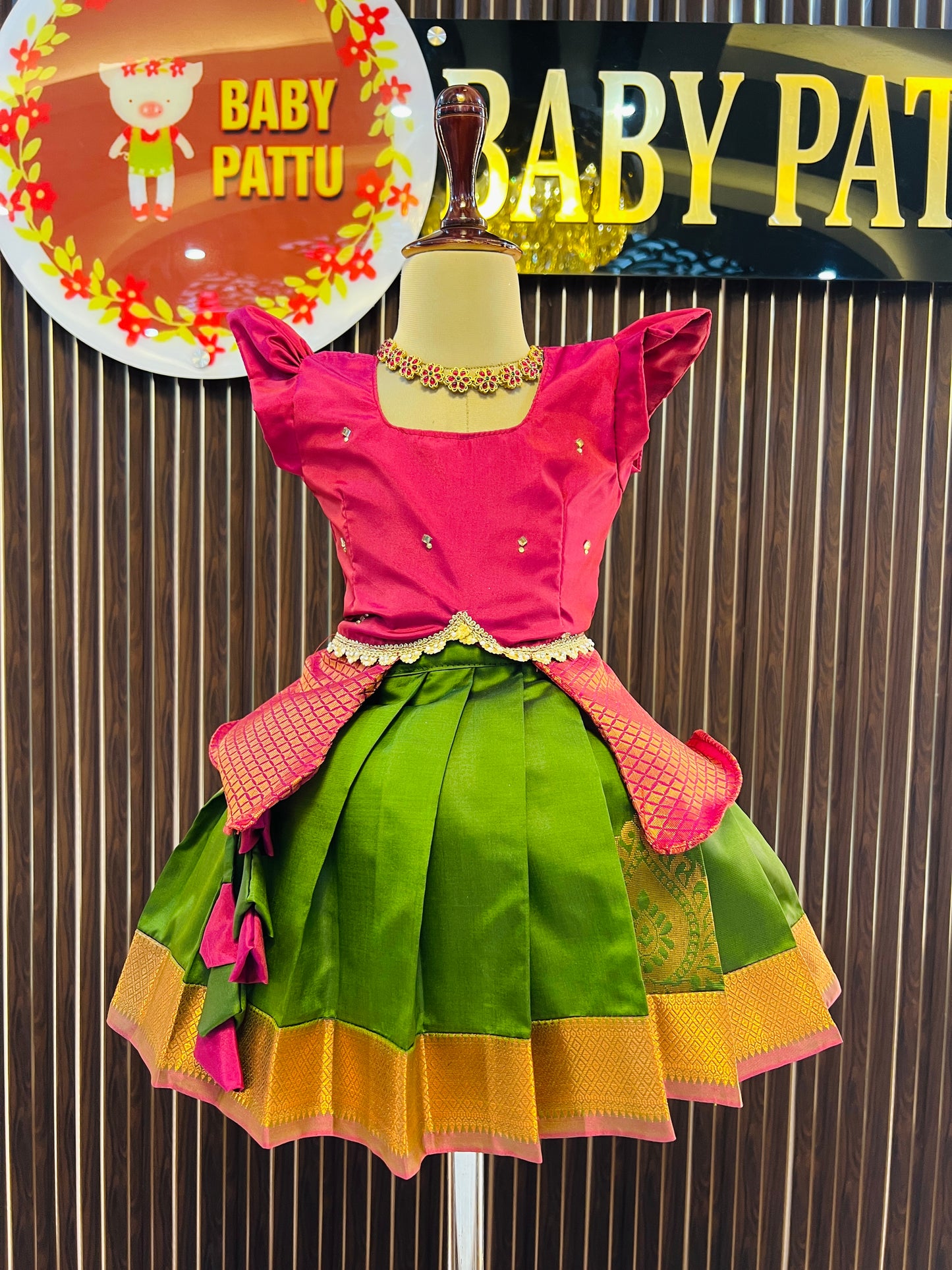 Maroon Peplum Top and Mehendi Green Pattu Pavada