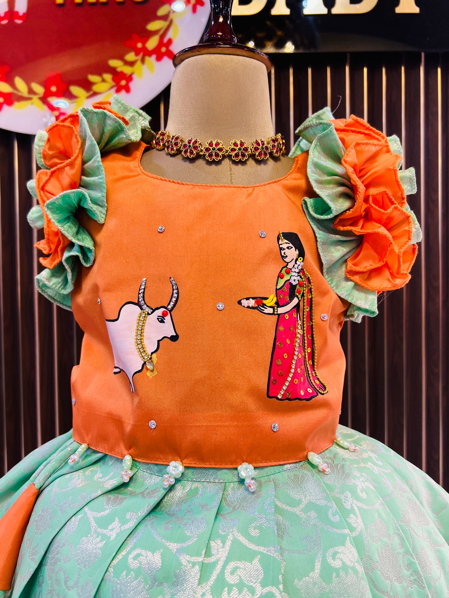 Orange Color Top And Mint Green Bottom Pattu Pavada - Pongal 2026 / Makara Sankranthi 2026 Collections