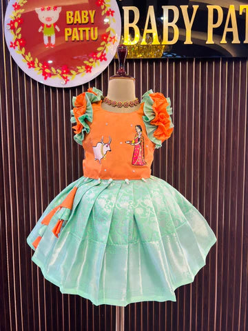 Orange Color Top And Mint Green Bottom Pattu Pavada